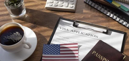 visa-application-composition-with-american-flag-1-scaled.webp